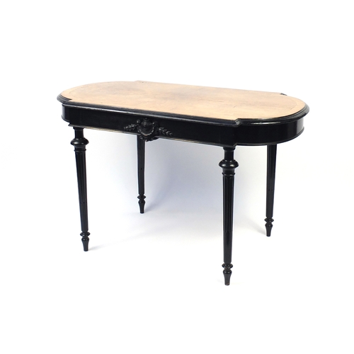 2059 - Quarter veneered and ebonised centre table raised on fluted legs, fitted with a drawer to one side, ... 