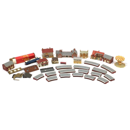 179 - Collection of OO gauge model outbuildings and a Tri-ang HO gauge locomotive with box