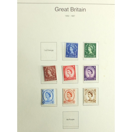 498 - Great Britain stamps and first day covers arranged in an album
