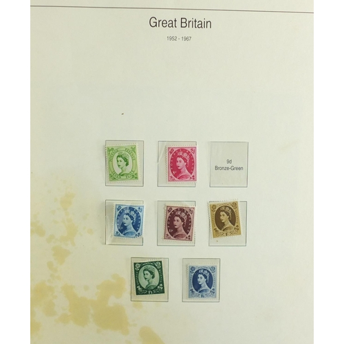 498 - Great Britain stamps and first day covers arranged in an album
