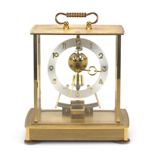 221 - Kundo brass cased electric mantel clock, 22cm high
