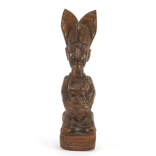 240 - African carved wood figure, 38cm high