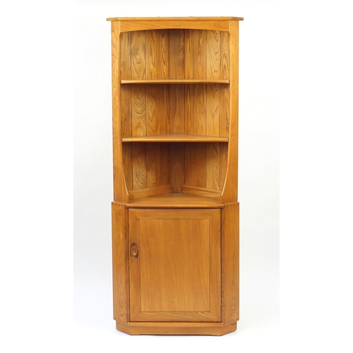 52 - Ercol light elm corner cupboard with three open shelves above cupboard base, 179cm H x 76cm W x 50cm... 