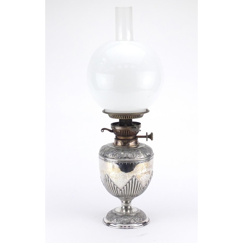 2103 - Silver plated oil lamp with white opaque Evered's patent burner and glass shade, 53cm high