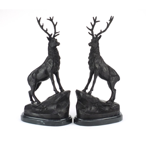 2105 - Pair of patinated bronze stags on shaped marble bases,signed J Moigniez, each 44cm high