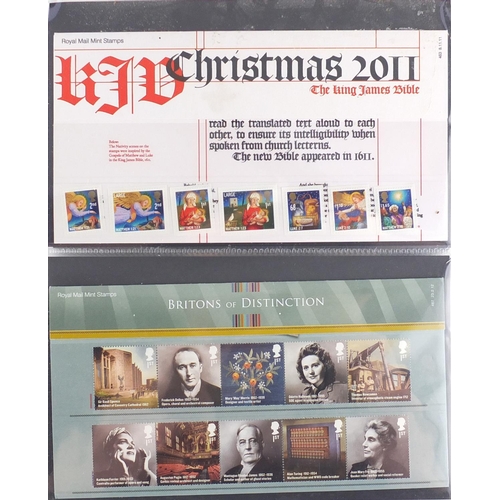 2299 - Collection of Royal Mail presentation packs arranged in two albums, various genres and denominations