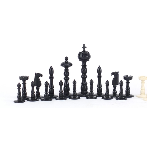 376 - 19th century carved bone half stained chess set, the largest piece 11cm high