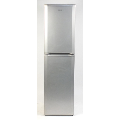 57 - Beko A+ class silver fridge freezer, 200cm H x 54cm W x 55cm D