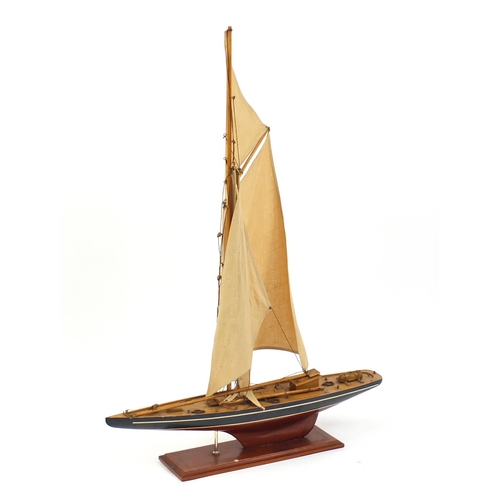 29 - Wooden model of a yacht, 105cm high