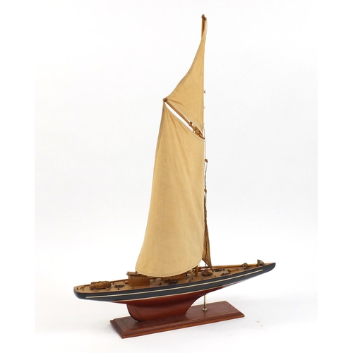 29 - Wooden model of a yacht, 105cm high