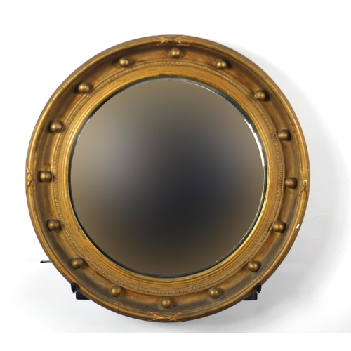 4 - Circular gilt wood convex mirror, 48cm in diameter