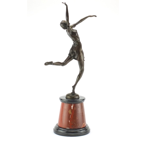 2073 - Large patinated bronze figure of an Art Deco female after B Zach, raised on a tapering black and red... 