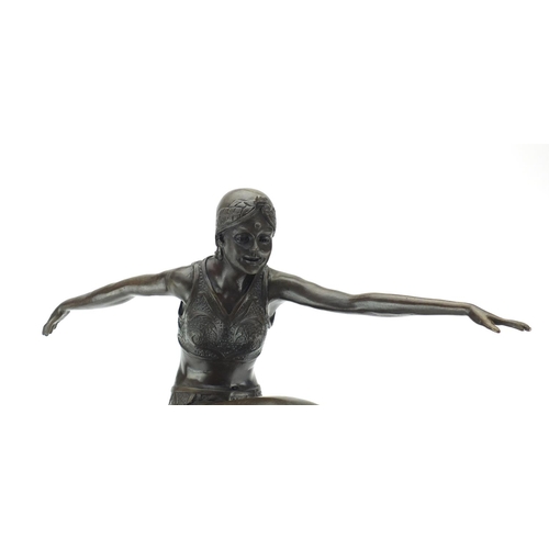 2065 - Large patinated bronze figure of an Art Deco dancing after J Philipp, raised on a circular marble ba... 