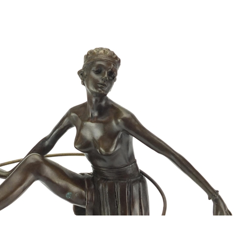 2004 - Large patinated bronze figure of an Art Deco semi nude hula hoopist after D Alonzo, raised on a circ... 