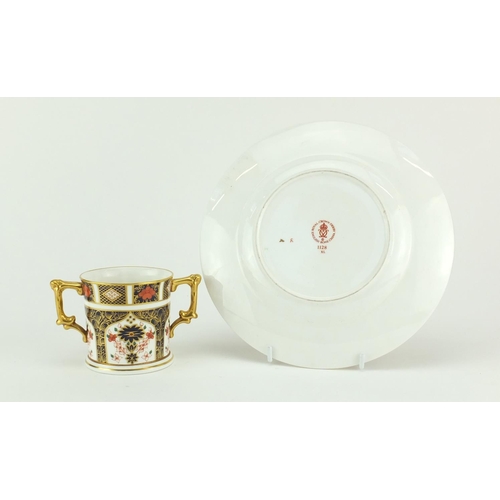 2115 - Royal Crown Derby Old Imari twin handled cup and plate, the largest 21.5cm in diameter