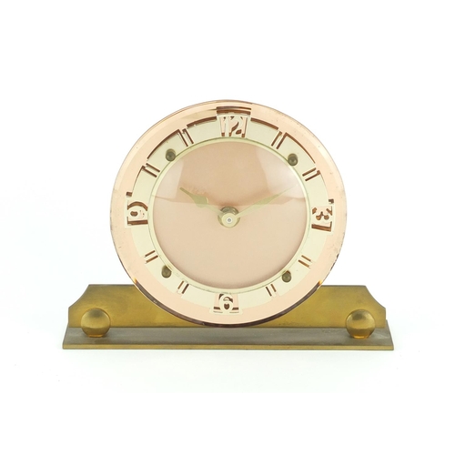 2069 - Art Deco chrome, brass and peach glass desk clock with Arabic numerals, 16.5cm high