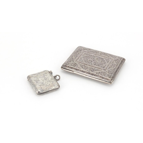 2252 - Rectangular silver vesta and a filigree cigarette case, the largest 9cm in length