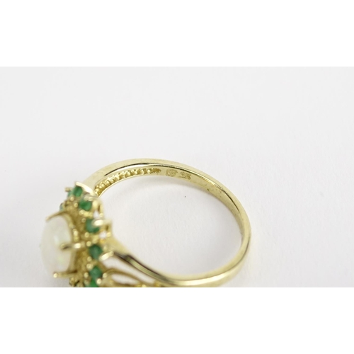 2366 - 9ct gold opal and emerald ring, size L, 2.0g