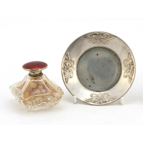 2261 - Two circular silver dishes and a cut glass scent bottle with silver and red guilloche enamel lid, th... 