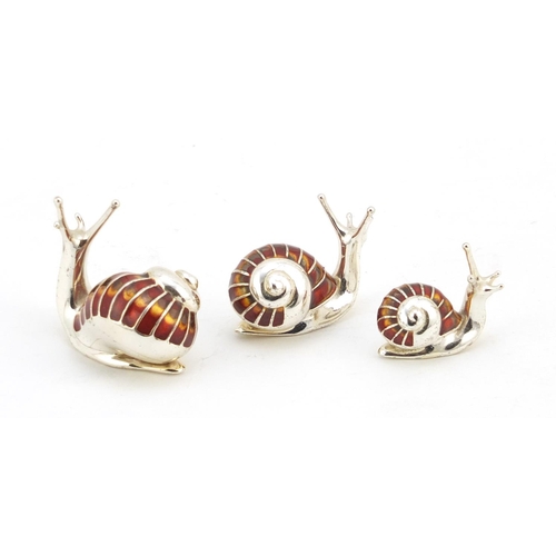 2247 - Graduated set of three Saturno silver and enamel snails, the largest 3.5cm in length, 46.0g
