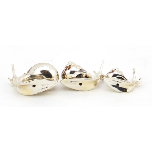 2247 - Graduated set of three Saturno silver and enamel snails, the largest 3.5cm in length, 46.0g