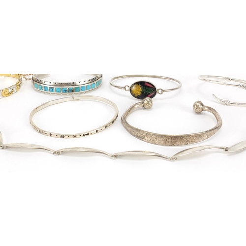 2436 - Silver and white metal bracelets and necklaces, one with turquoise, 141.2g