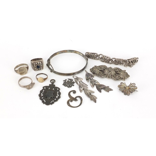 2451 - Silver and white metal jewellery including rings, brooches and earrings, 96.5g