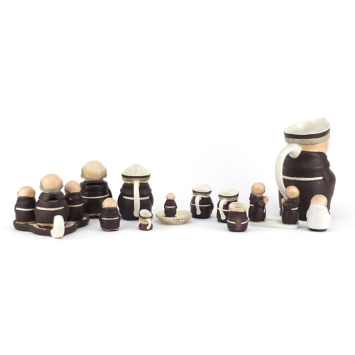 2212 - Goebel monk design porcelain including cruets, jugs and a money box, the largest 21cm high