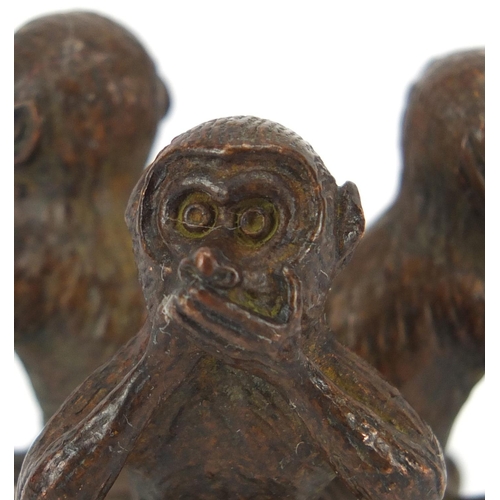 2283 - Japanese patinated bronze group of The Three Wise Monkeys, impressed marks to the base, 4cm high