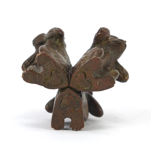 2283 - Japanese patinated bronze group of The Three Wise Monkeys, impressed marks to the base, 4cm high