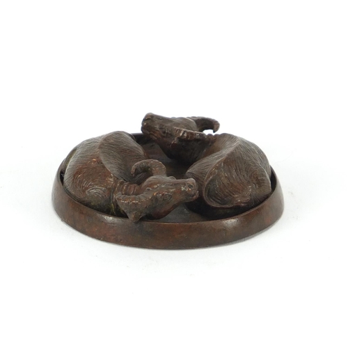 2286 - Japanese patinated bronze of two water buffaloes, impressed marks to the underside, 5cm in diameter