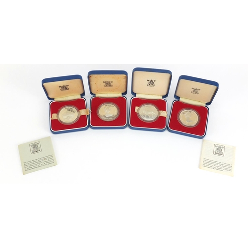 2336 - Four silver proof commemorative crowns