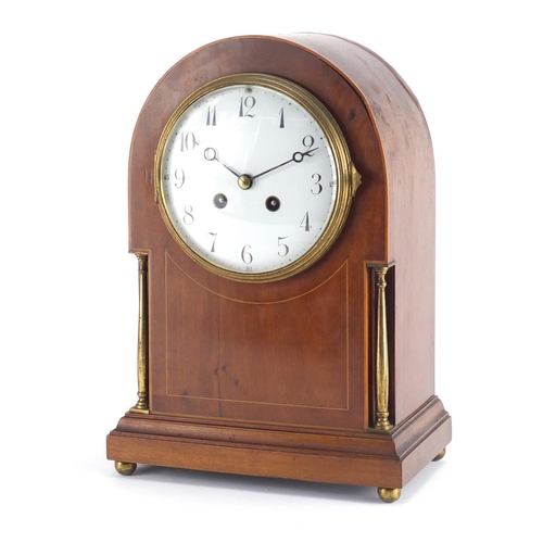 2104 - Edwardian inlaid mahogany bracket clock with brass columns, enamel dial and Arabic numerals, 32cm hi... 