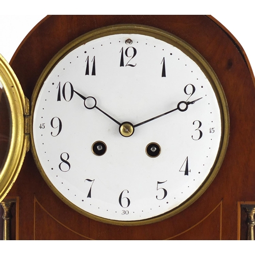 2104 - Edwardian inlaid mahogany bracket clock with brass columns, enamel dial and Arabic numerals, 32cm hi... 