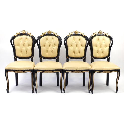 2007 - Italian style black and gold painted circular dining table and four chairs, with cream leather butto... 