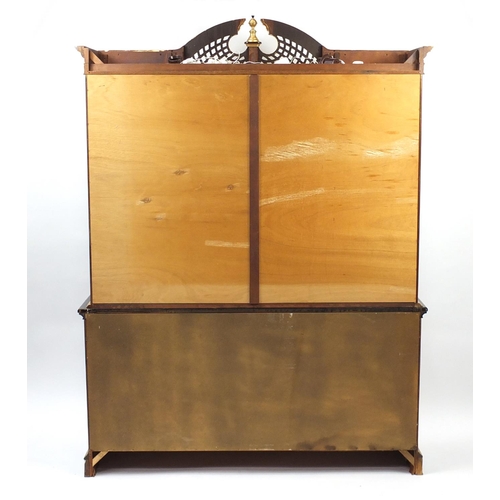 2002 - Italian style black and gold painted display cabinet with four glazed doors above a series of drawer... 