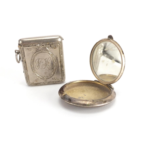 2264 - Circular silver compact and a white metal vesta, the compact Birmingham hallmarked, 5cm in diameter