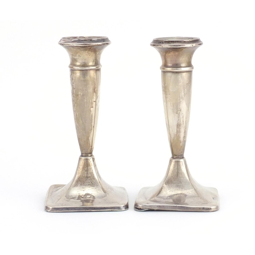 2244 - Pair of silver square based tapering candlesticks by W J Myatt & Co, Birmingham, 13cm high