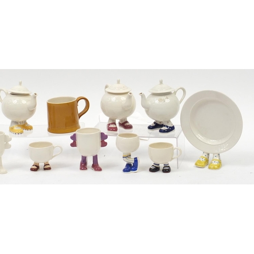 2133 - Carlton Ware Walking Ware and a man in a cup including teapots and milk jug, the largest 25.5cm high