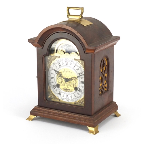 2067 - Franz Hermle mahogany cased mantel clock with moon phase dial, 28cm high