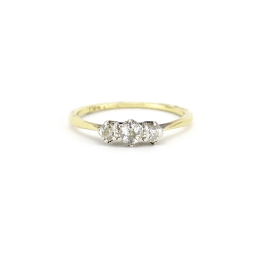 2354 - 18ct gold diamond three stone ring, size N, 1.9g