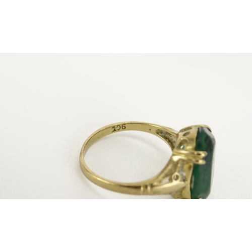 2380 - 9ct gold cameo maiden head ring and a 9ct gold green stone ring, sizes H and L, 6.5g