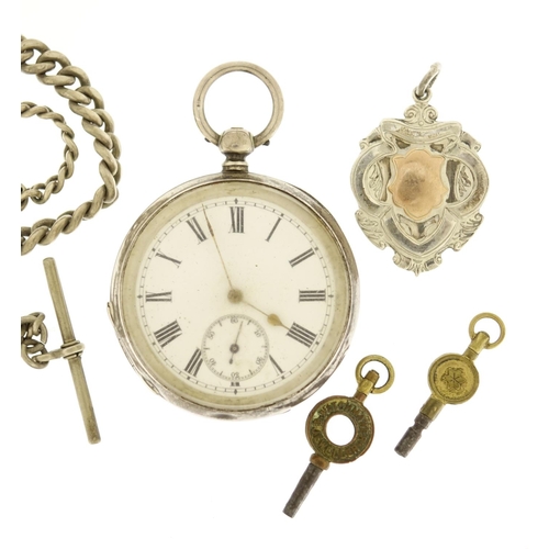 2375 - Gentleman's silver open face pocket watch, with graduated silver watch chain and sports jewel, 5cm i... 