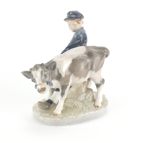2194 - Royal Copenhagen figure of a boy with a calf, number 772, 17.5cm high