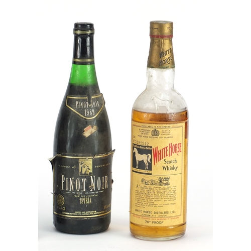 2198 - Four vintage bottles of alcohol comprising White Horse scotch whisky, two bottles of 1965 Pomagne an... 