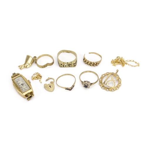 2347 - 9ct gold jewellery including rings, charms and a wristwatch, 22.0g