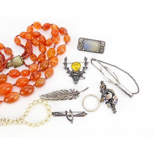 2454 - Victorian and later jewellery including silver brooches and a carnelian necklace, 177.0g