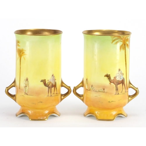 2135A - Pair of Royal Doulton desert pattern vases with twin handles, by H Allen, each 17.5cm high