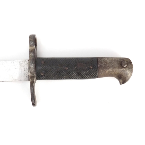 321 - German Military interest saw back bayonet with scabbard, impressed marks to the blade, 63.5cm wide