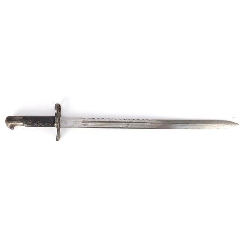 321 - German Military interest saw back bayonet with scabbard, impressed marks to the blade, 63.5cm wide